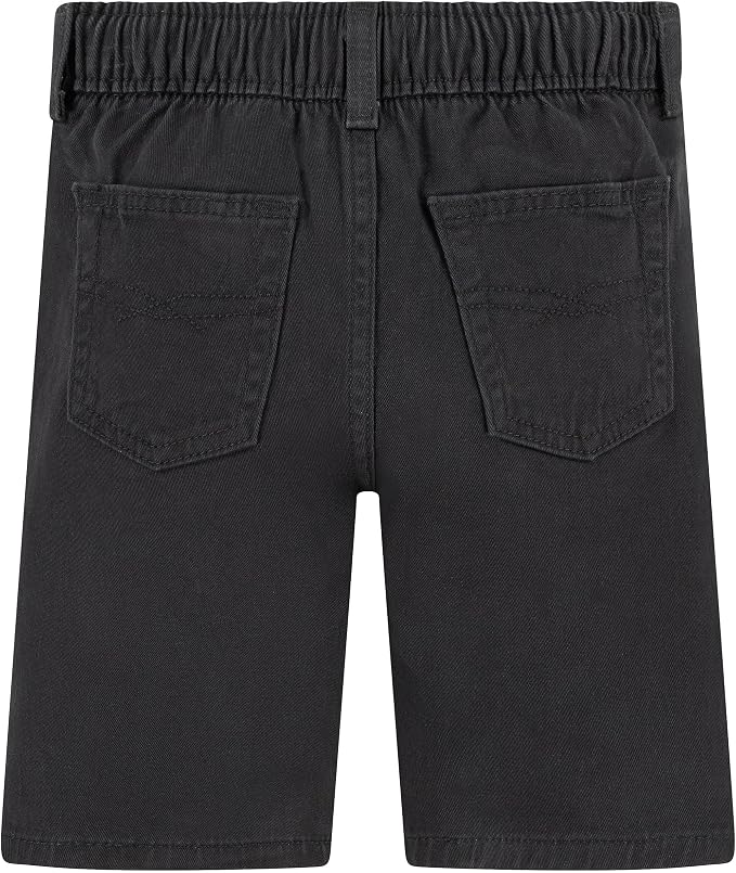 Back view of dark black denim shorts featuring an elastic waistband and 4 large patch pockets.