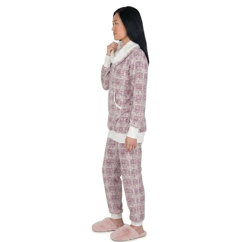 Person wearing a pink and white checkered onesie with a hood on a white background
